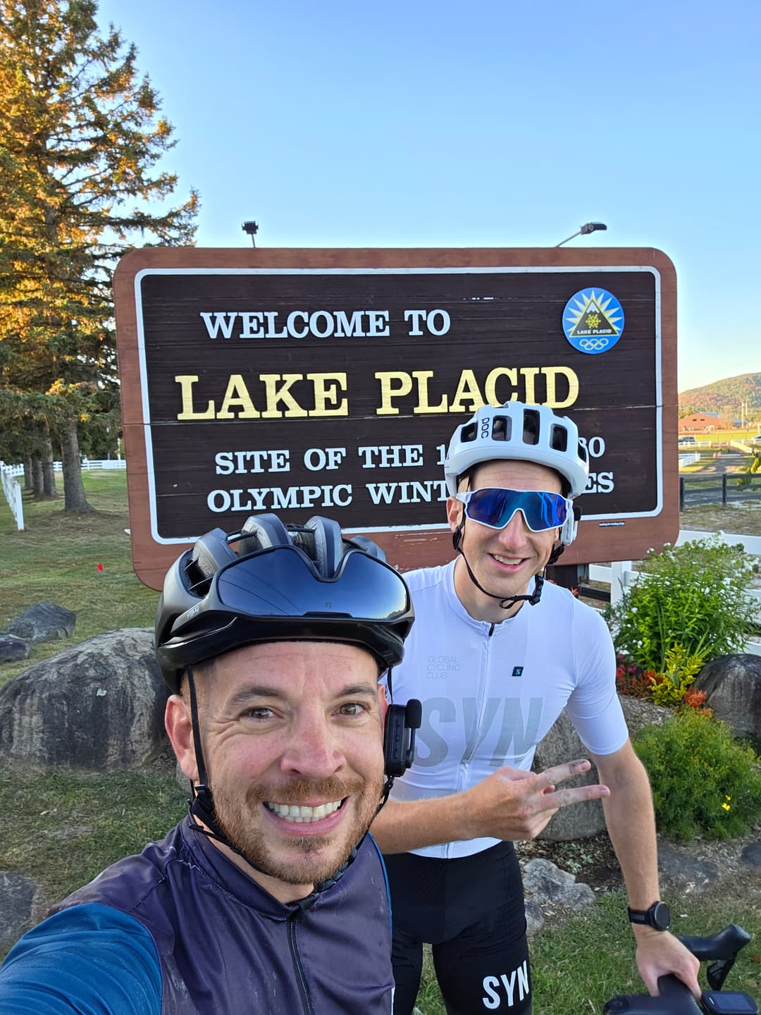 Pat at the Lake Placid sign after the Melvil Dewey ride